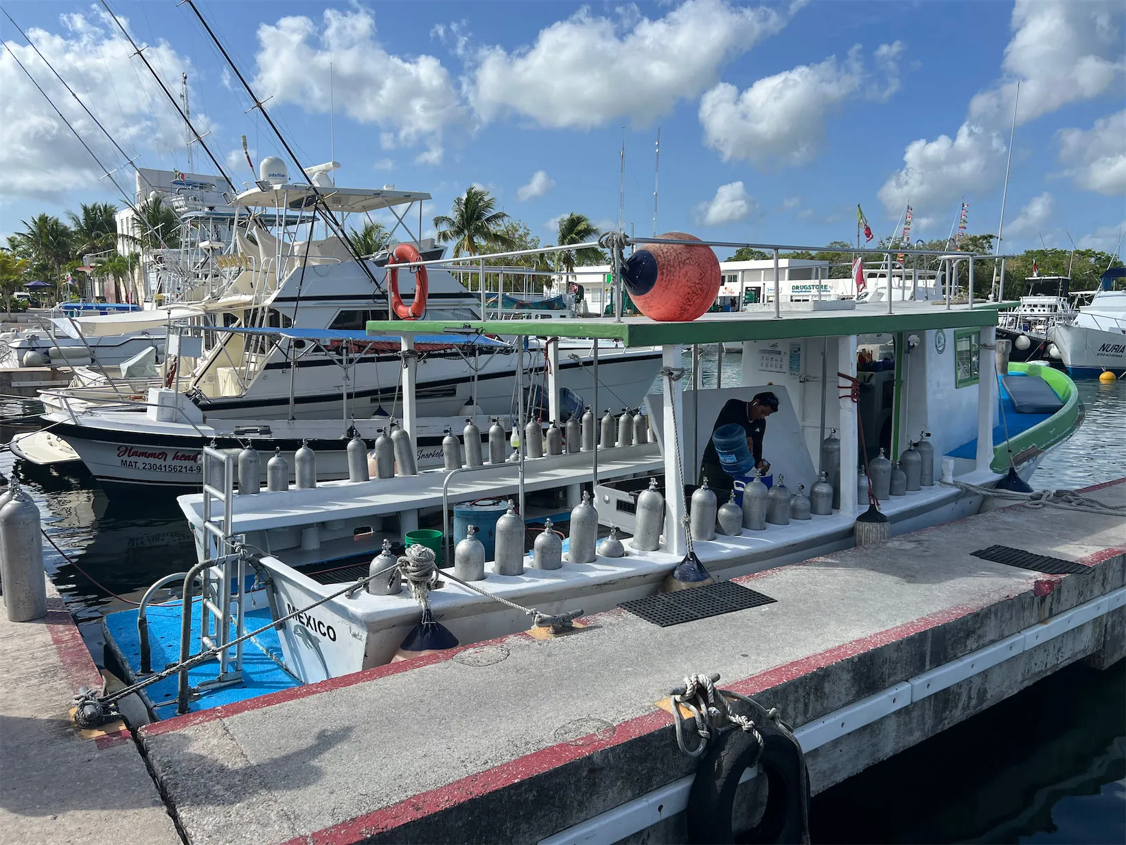 A dive boat on calm turquoise water off Cozumel on a sunny morning
